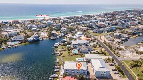 an aerial view of a small town next to the ocean at Long Island at Laguna Point in Destin