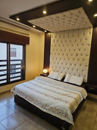 Katil atau katil-katil dalam bilik di Apartment no 30