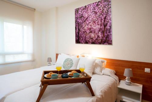 Katil atau katil-katil dalam bilik di Apartamentos GO Covaresa Parking Bajo disponibilidad- Zona libre de bajas emisiones