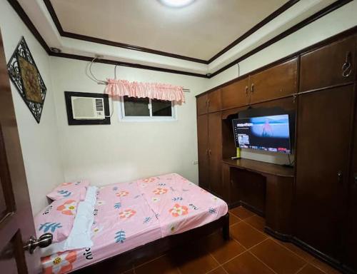 Katil atau katil-katil dalam bilik di House in tarlac cozy
