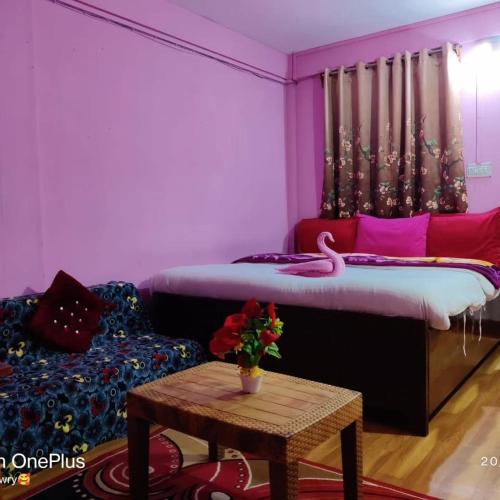 Postel nebo postele na pokoji v ubytování Lalam Guest and Homestay