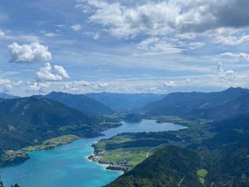 an aerial view of a lake in the mountains at Reiterhof Suassbauer in St. Wolfgang