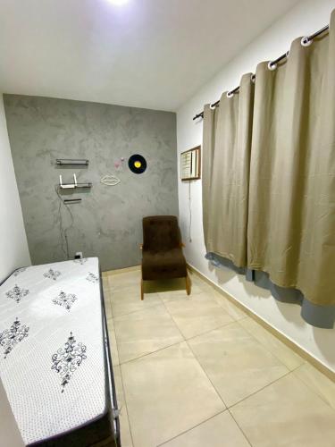 Katil atau katil-katil dalam bilik di Casa aconchego