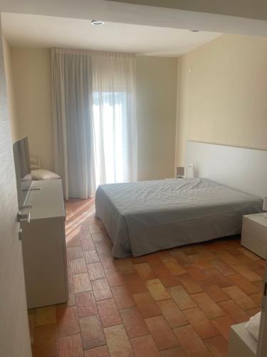 Postel nebo postele na pokoji v ubytování Bellavista Rooms