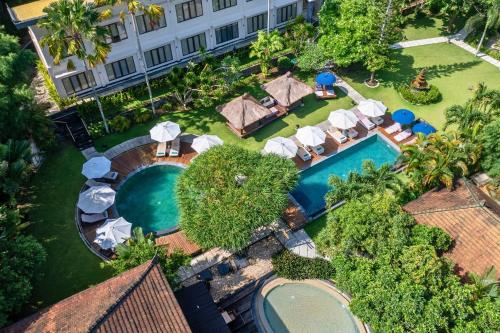 an aerial view of a resort with a swimming pool at S Resorts Hidden Valley Bali in Uluwatu