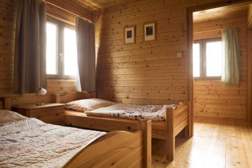 Postel nebo postele na pokoji v ubytování Chata Vičanov