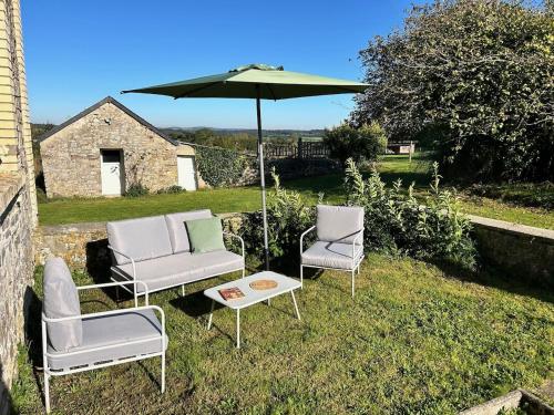 حديقة خارج Maison de famille au cœur du bocage normand
