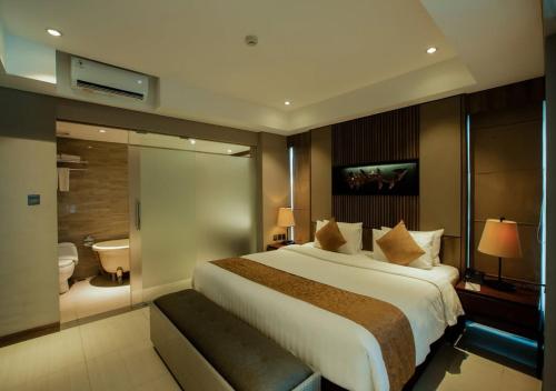 Postel nebo postele na pokoji v ubytování De Atlantiis Suites Near IGI Airport