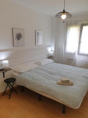 Katil atau katil-katil dalam bilik di Apartamento El roble