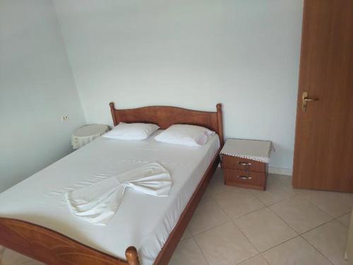 Llit o llits en una habitació de Erioni Apartment