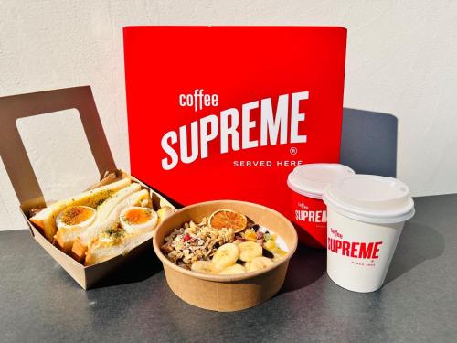 a box of coffee supreme and two cups of coffee at fav HIROSHIMA HEIWAODORI in Hiroshima