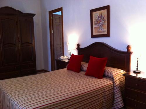 Ένα ή περισσότερα κρεβάτια σε δωμάτιο στο Hotel El Molino