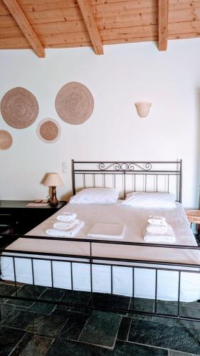 Posteľ alebo postele v izbe v ubytovaní House Moschα