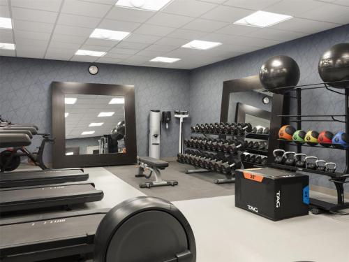 a fitness room with a gym with weights at Homewood Suites by Hilton Akron/Fairlawn in Akron