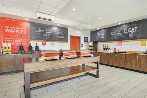 a fast food restaurant with a counter with three buns at Hampton Inn Virginia Beach Oceanfront North in Virginia Beach