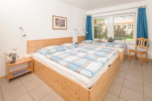 Postel nebo postele na pokoji v ubytování Reihenhaus, 35 qm, 1 Schlafzimmer