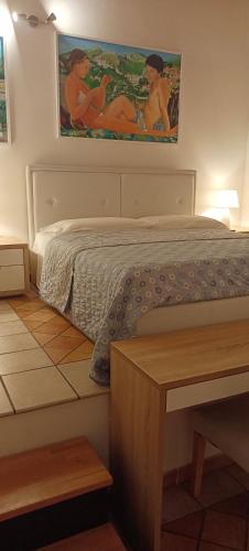 Ένα ή περισσότερα κρεβάτια σε δωμάτιο στο B&B Villa Bucceri