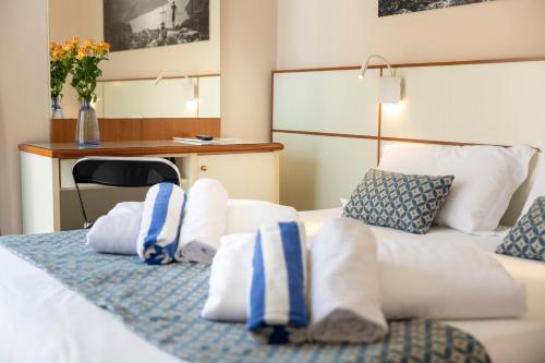 Hotel Holiday Sport & Relaxにあるベッド