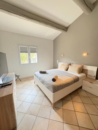 Posteľ alebo postele v izbe v ubytovaní "La villa Mariam" Jacuzzi Piscine Jardin Pétanque