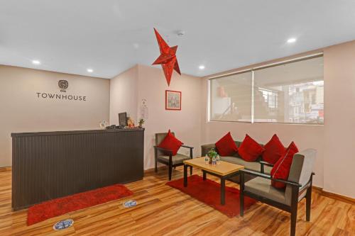 Zona de estar de Townhouse The Shubham