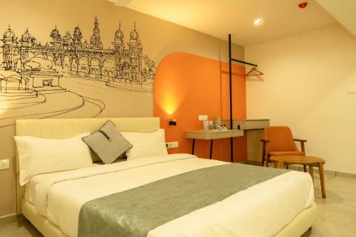 a bedroom with a bed with a drawing on the wall at Hotel City Pride in Mahuva