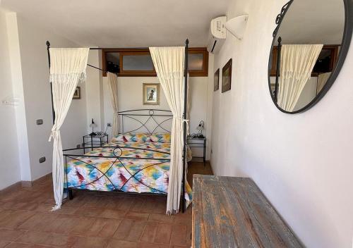 A bed or beds in a room at Casa Katia, Giuliana & Nami