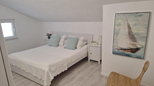 Posteľ alebo postele v izbe v ubytovaní Bella Apartments