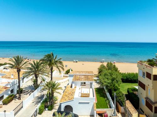 Urbanización El Oasis, 20 Villas en 1ª Línea Playa