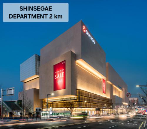 a building with a sale sign on the side of a street at 로맨틱 프라이빗 테라스, 무료주차, 2룸 in Daegu