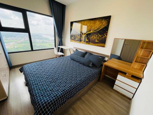 Ένα ή περισσότερα κρεβάτια σε δωμάτιο στο Căn hộ Vinhomes 2BR view sông Đồng Nai