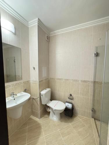 A bathroom at OLYMP Apart-Complex