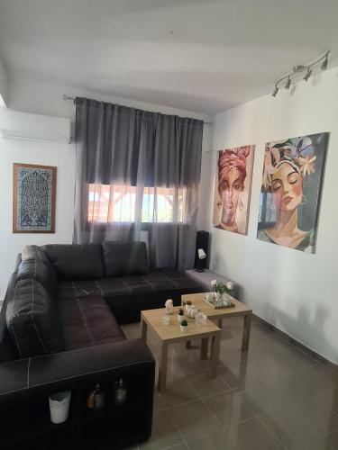 Χώρος καθιστικού στο Sunset Paradise Villa Stroumpi