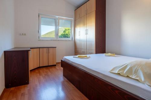 Ένα ή περισσότερα κρεβάτια σε δωμάτιο στο Apartment Pinea