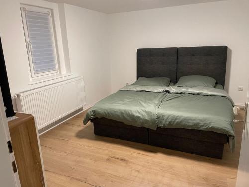 Postel nebo postele na pokoji v ubytování Apartament by B