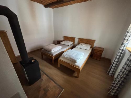 Postel nebo postele na pokoji v ubytování Na spoločnom dvore