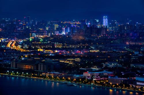 a view of a city at night at Sofitel Kunming in Kunming