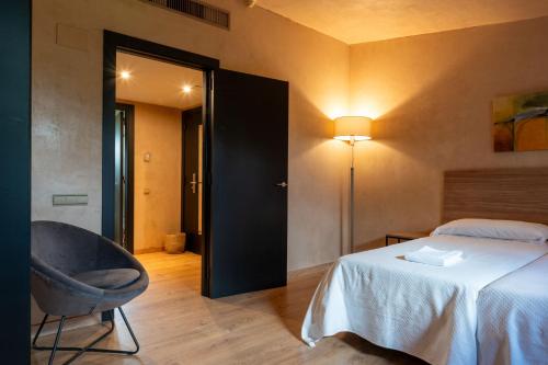 Кровать или кровати в номере Hotel Xalet del Golf