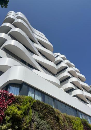 a building with balconies on the side of it at Hotel Arena Select in Valencia