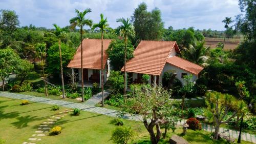 an aerial view of a house with a garden at Le Palmier Long An Boutique Resort - Free Outdoor Cinema in Ấp Kế Mỹ
