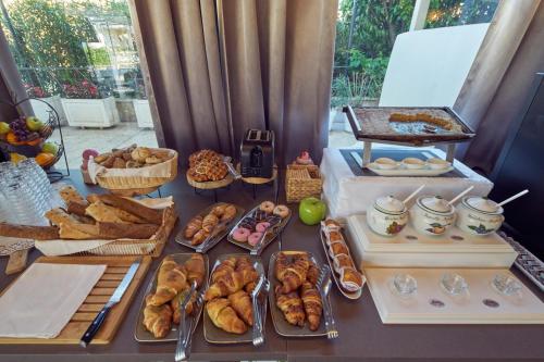 a table topped with lots of different types of food at Boutique Hotel Life in Rogoznica