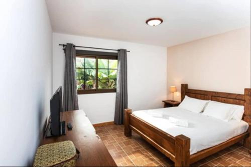 Postel nebo postele na pokoji v ubytování Casa LA VERA