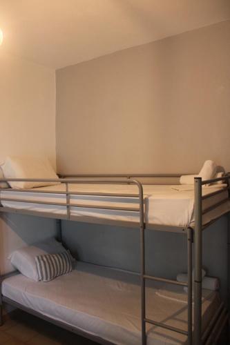 a group of bunk beds in a room at LaCasa Garden in Skiathos