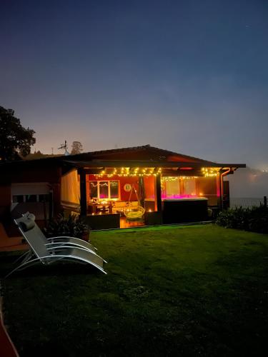 a house with lights on the front of it at Oviedo Real Spa in Oviedo