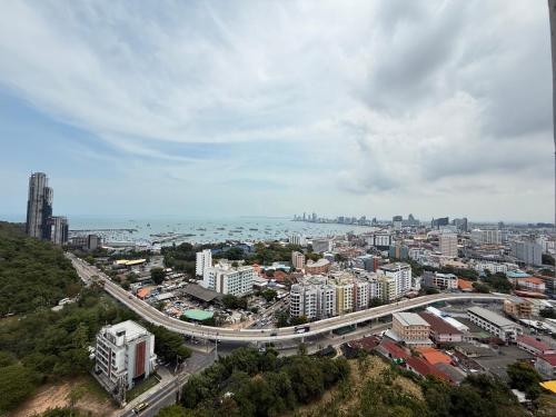an aerial view of a city with a highway at Condo Sea view Beach U25 in Pattaya South