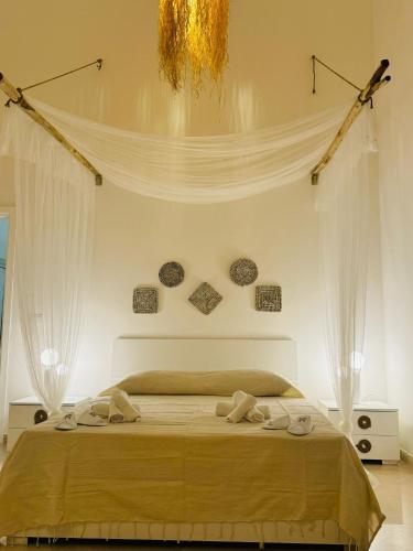 Llit o llits en una habitació de Borgo Rosalia