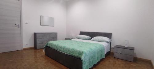 Katil atau katil-katil dalam bilik di Alloggio Tobia centro Biella