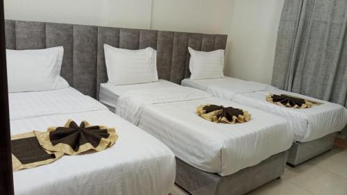 Katil atau katil-katil dalam bilik di Beauty Rose ApartHotel