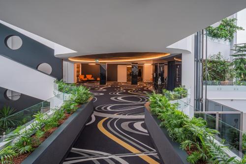 a rendering of the lobby of a building at Hotel Ózon & Luxury Villas in Mátraháza