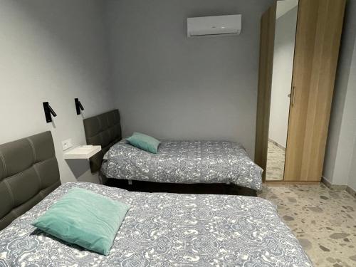 Ένα ή περισσότερα κρεβάτια σε δωμάτιο στο DULCINEA