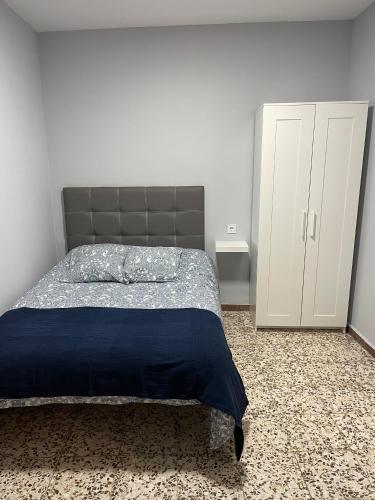 Ένα ή περισσότερα κρεβάτια σε δωμάτιο στο DULCINEA